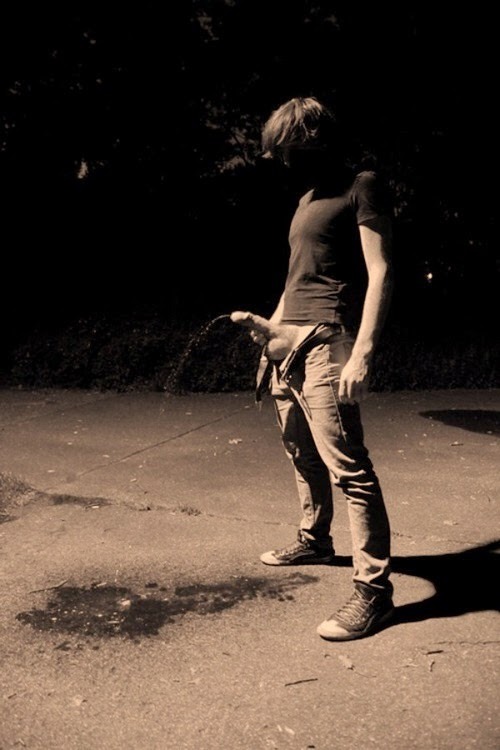 Gay young boy pissing outdoor